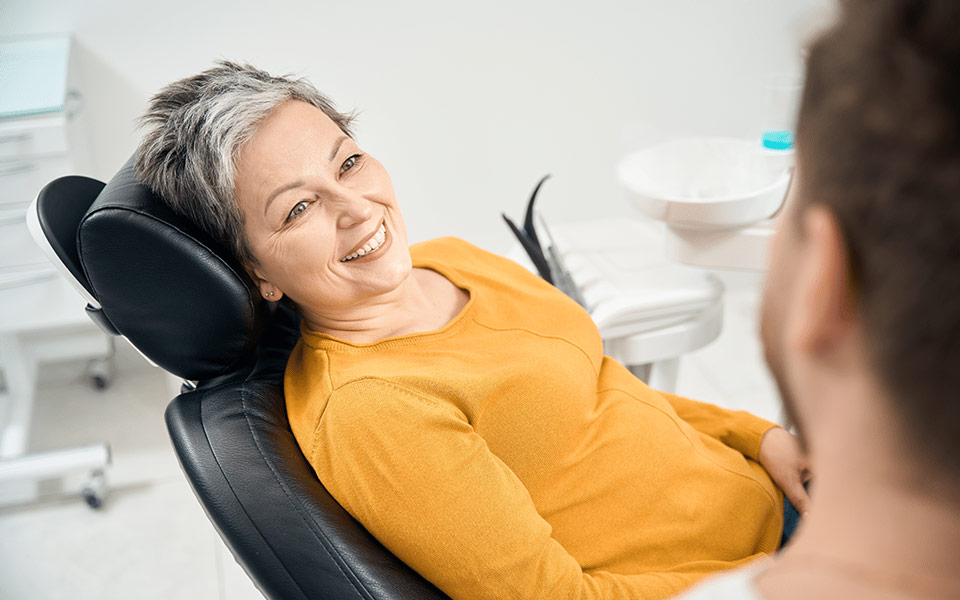 Woman talking to her dentist