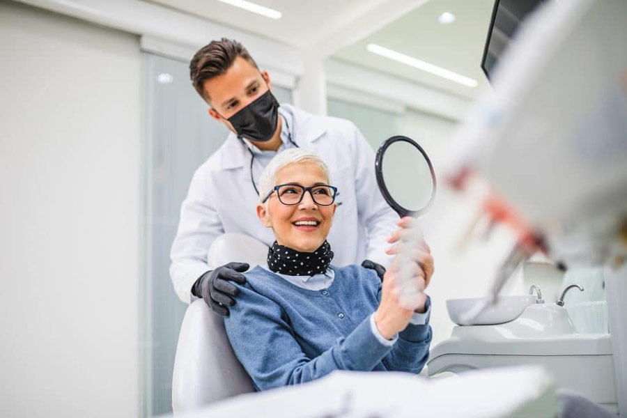 Woman looking at her teeth