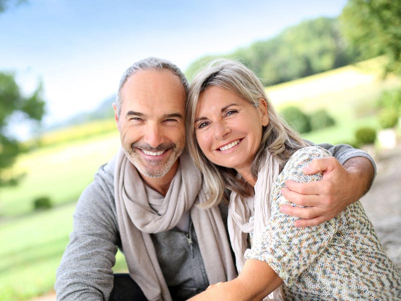 smiling middle aged couple