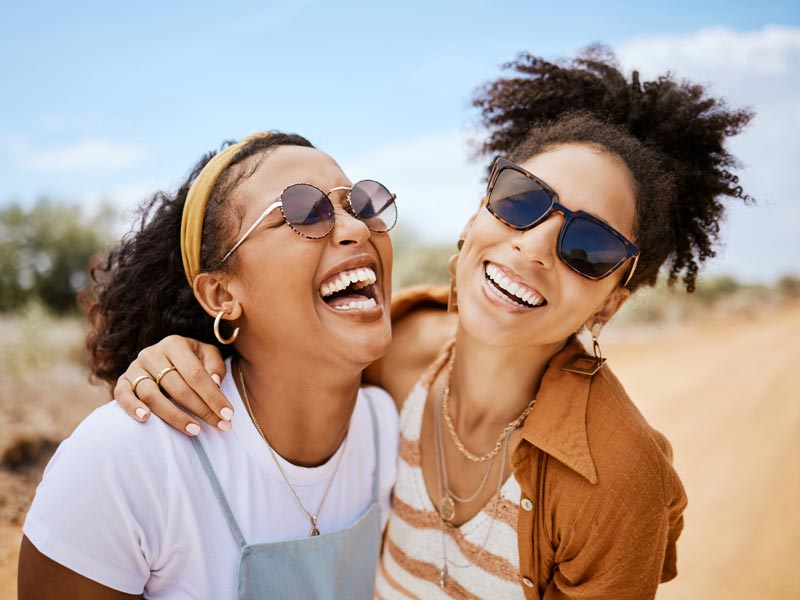 two friends laughing together