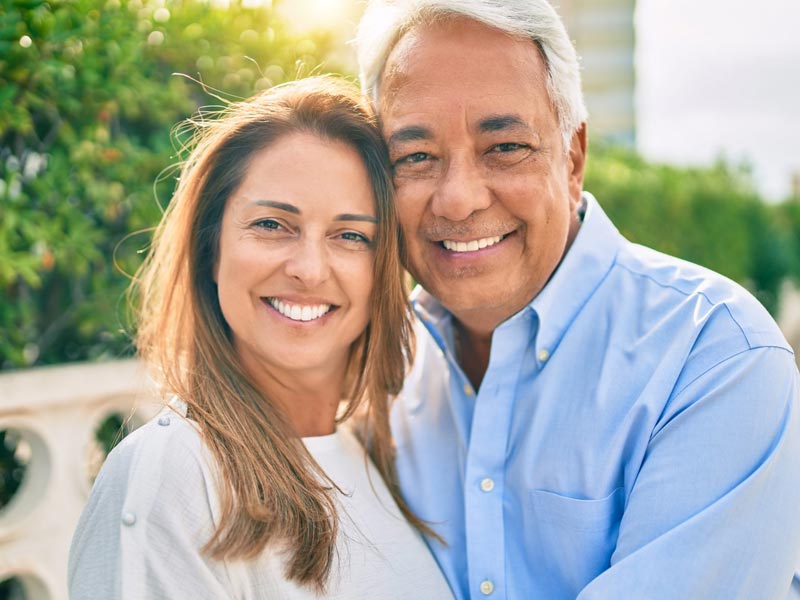 smiling middle aged couple